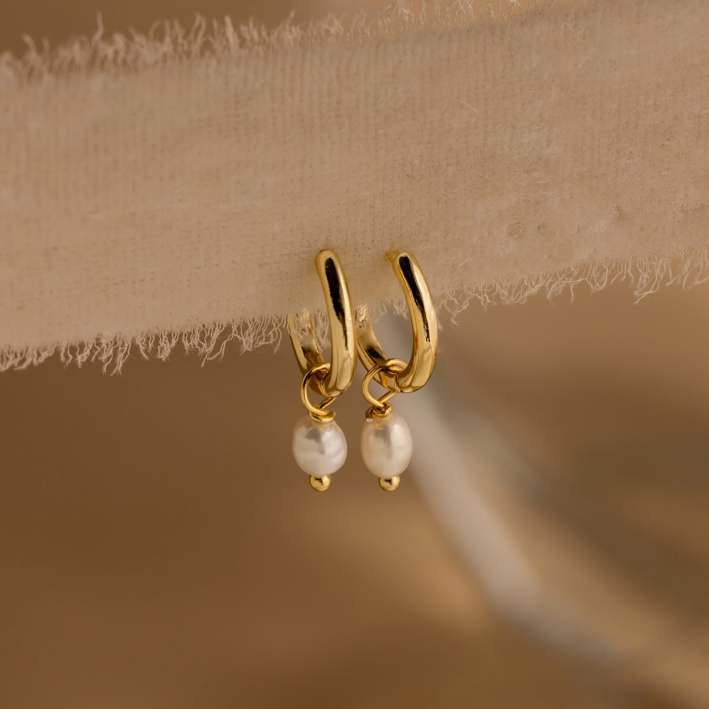 Dainty Pearl Huggies in 18K Gold