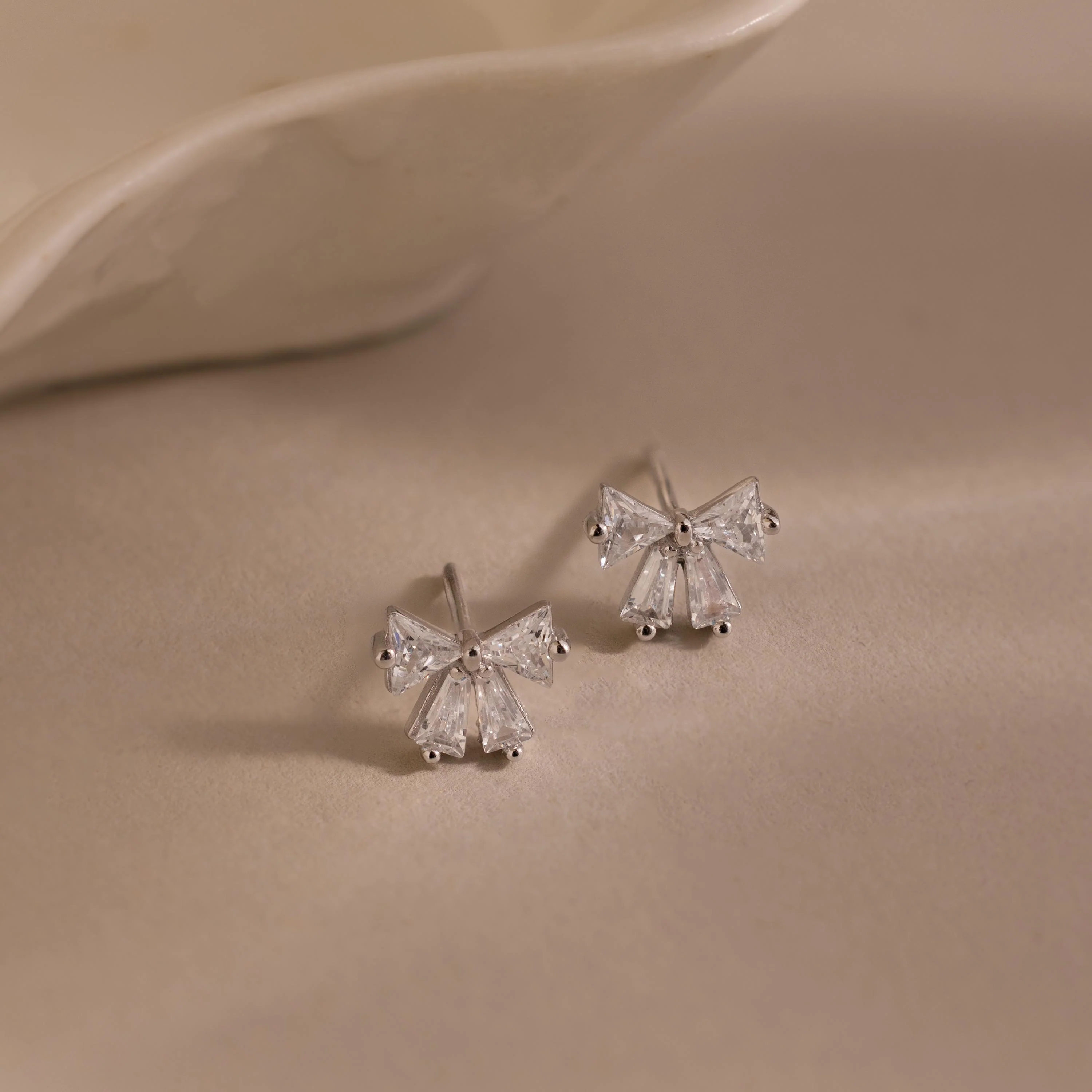 Diamond Bow Studs in Silver