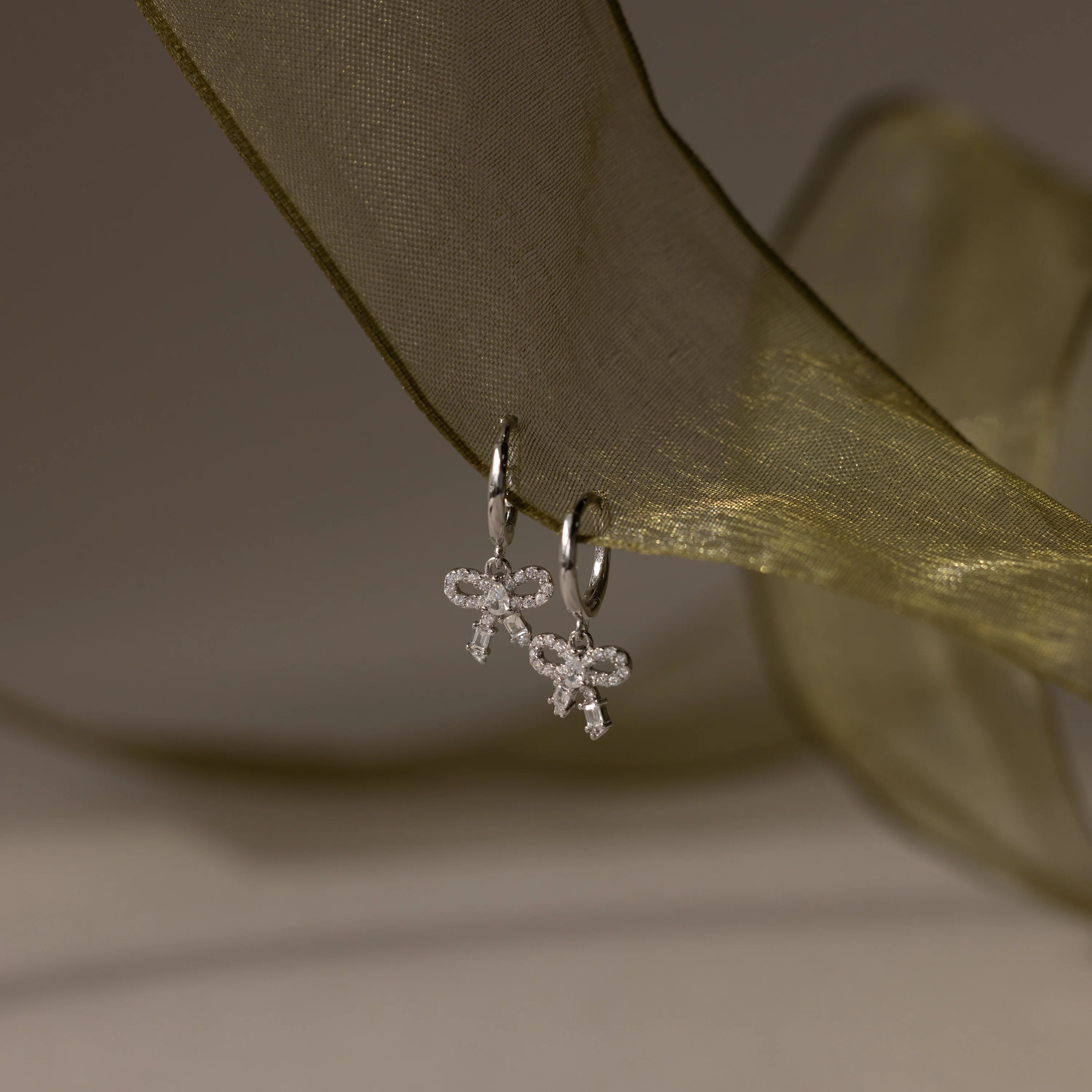 Pave Bow Charm Hoops in Silver - Image 7