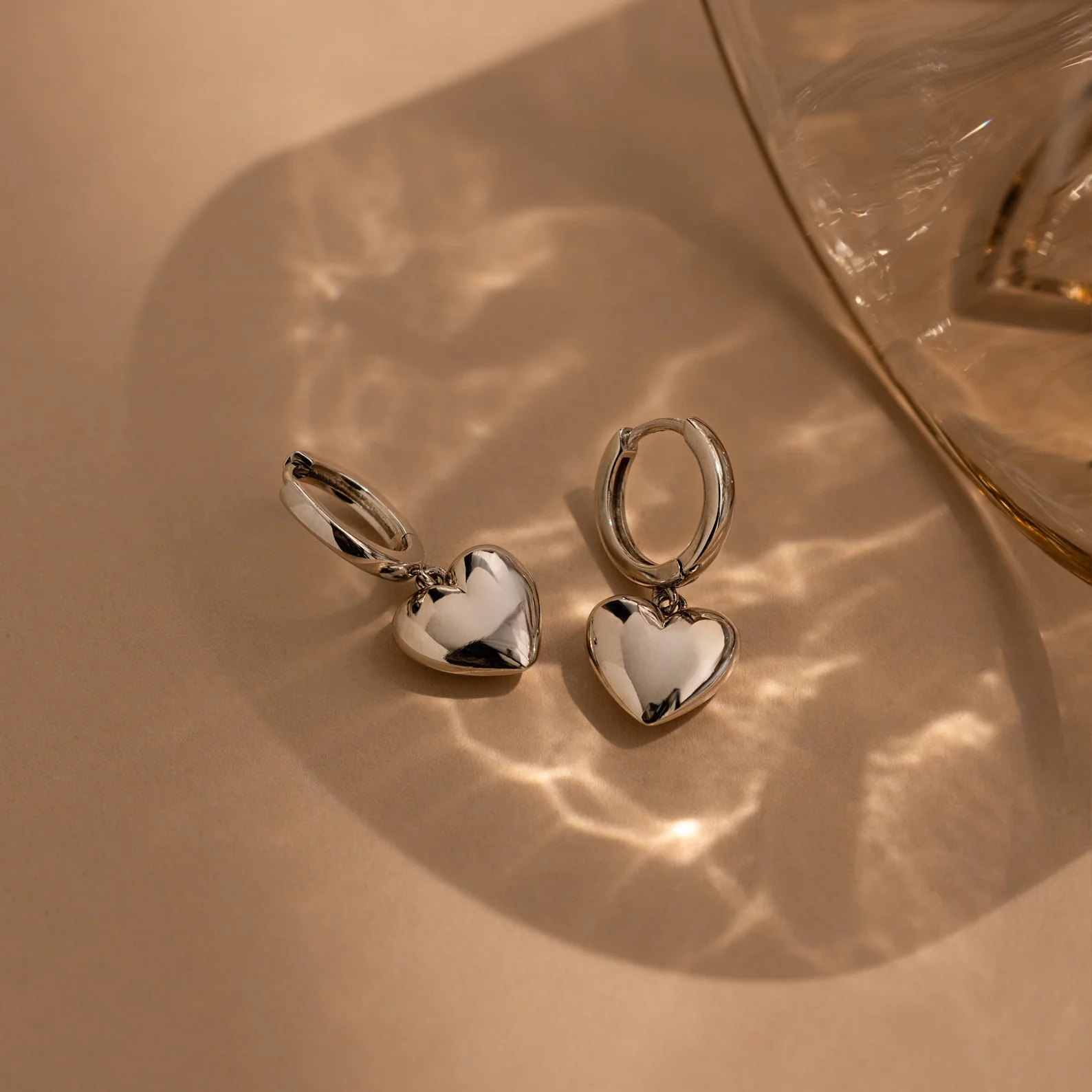 Puff Heart Charm Huggies in Silver