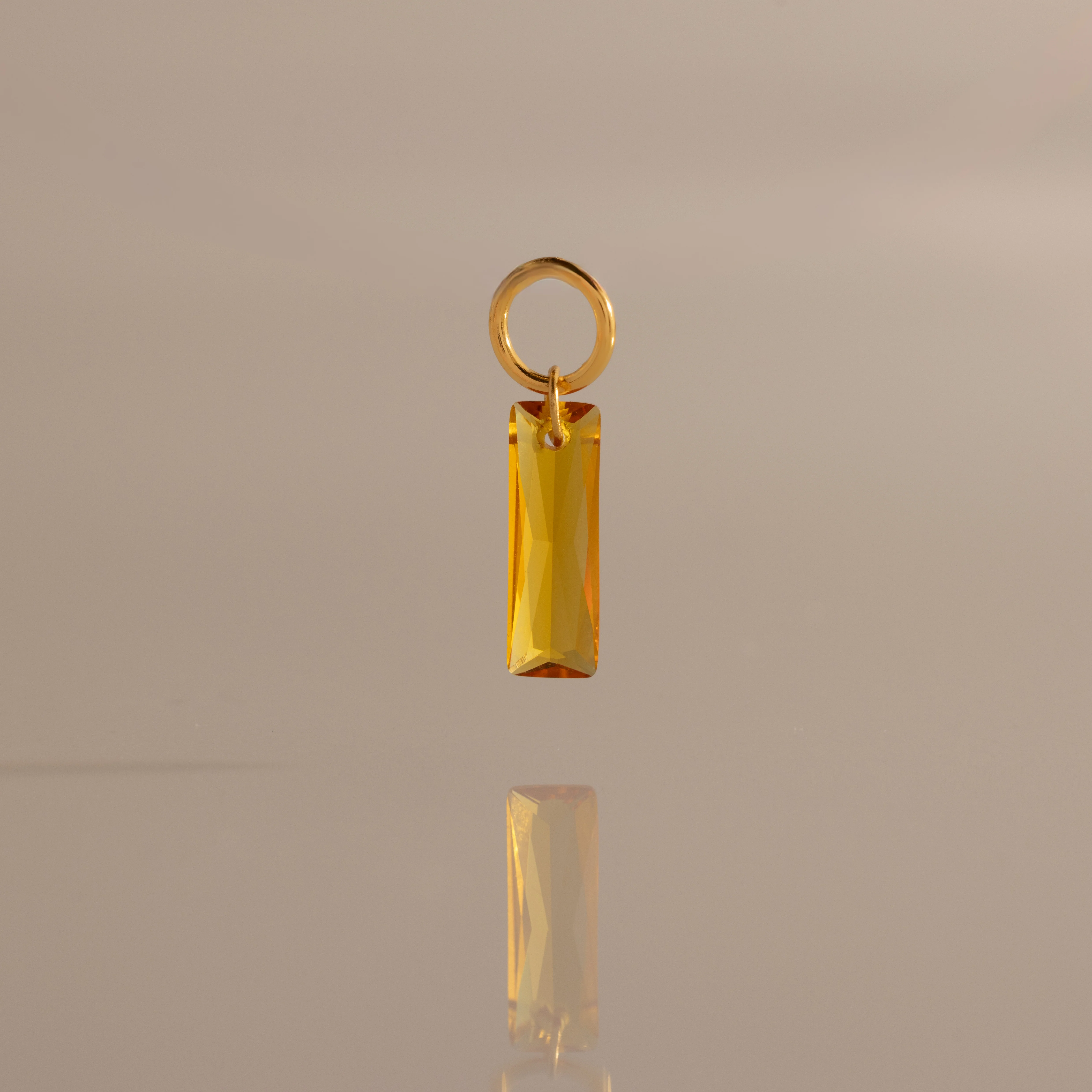 Skinny Baguette Topaz Charm