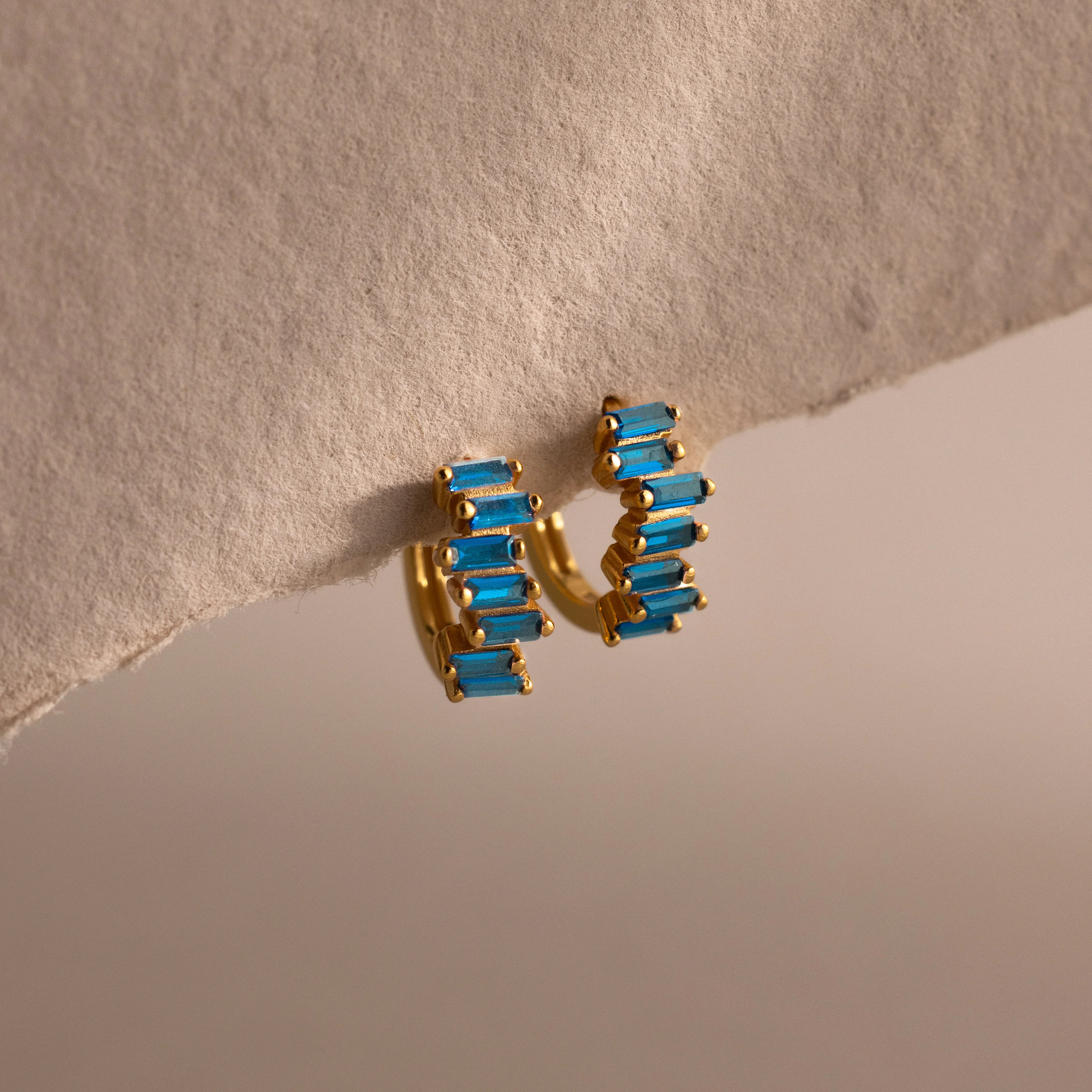 Staggered Baguette Blue Zircon Huggies
