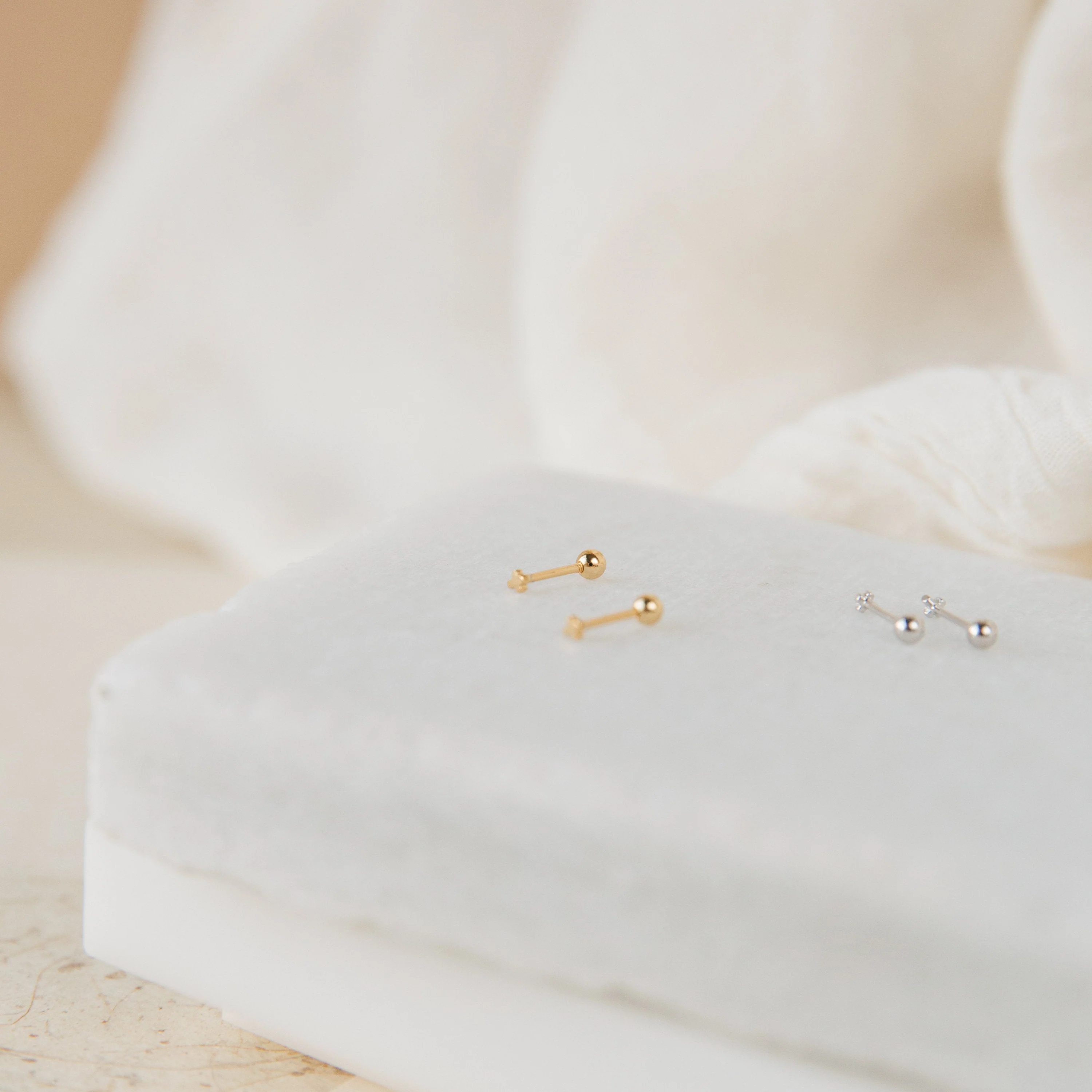 Tiny Cross Studs in Silver