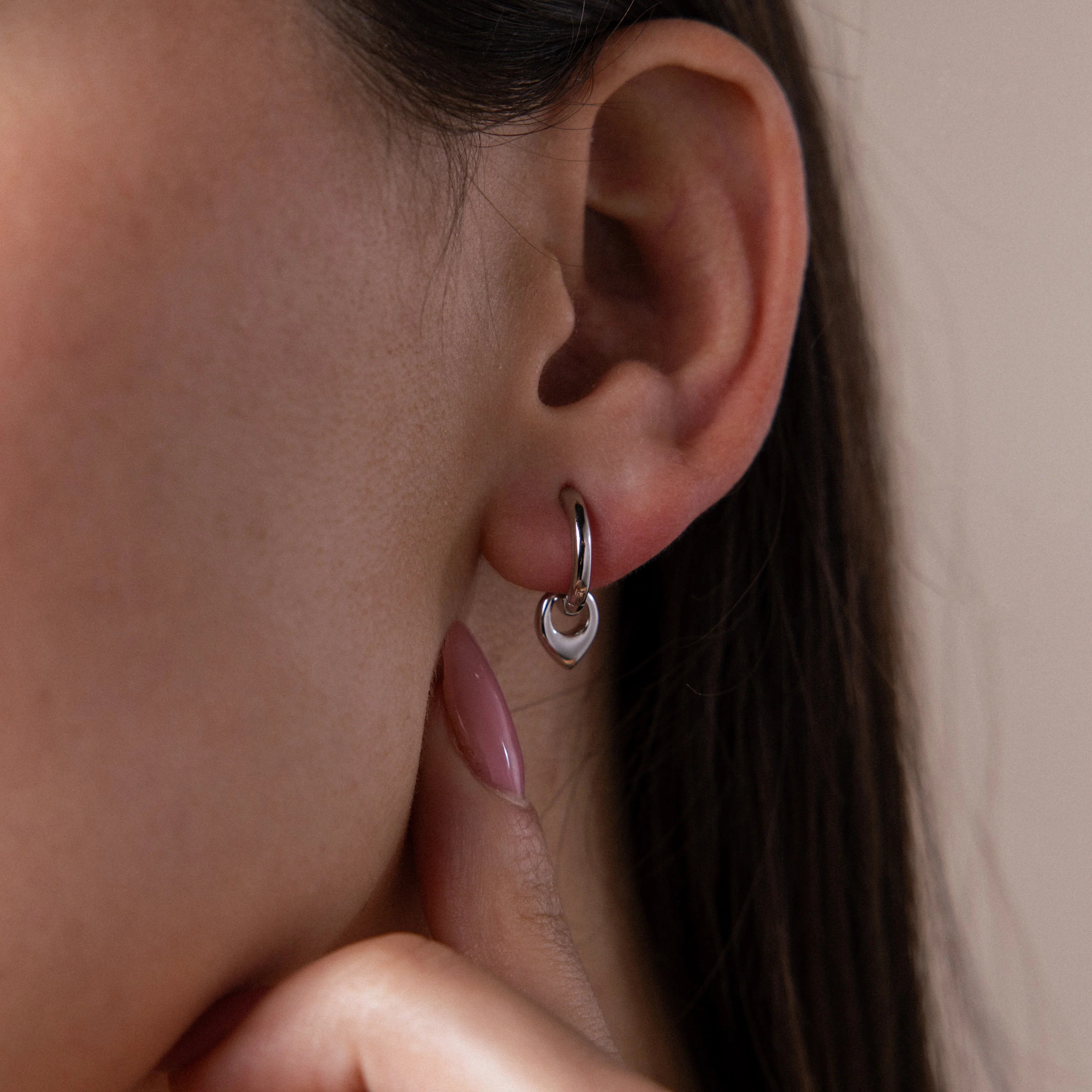 Tiny Teardrop Huggies in Silver - Image 2
